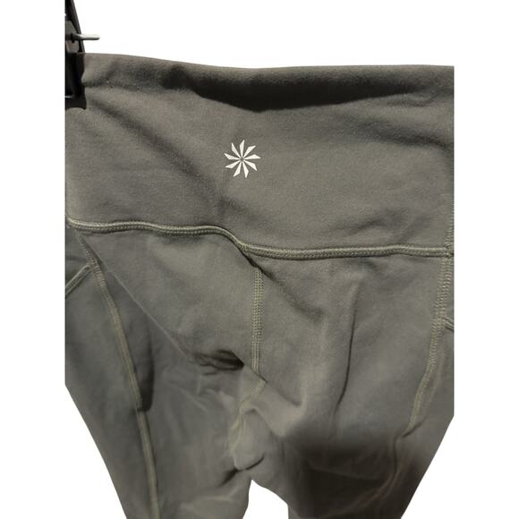 Athleta Salutation Stash Pocket II Laser Cut 7/8 Tight Leggings – Olive Green XS - Picture 4 of 5
